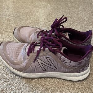 New Balance brand, purple shoes (laces)(worn a couple times but looks brand new)